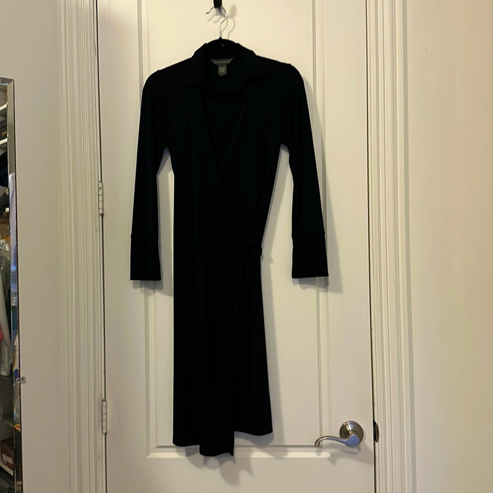 Black wraparound rayon long sleeved dress. Knee length, size small.